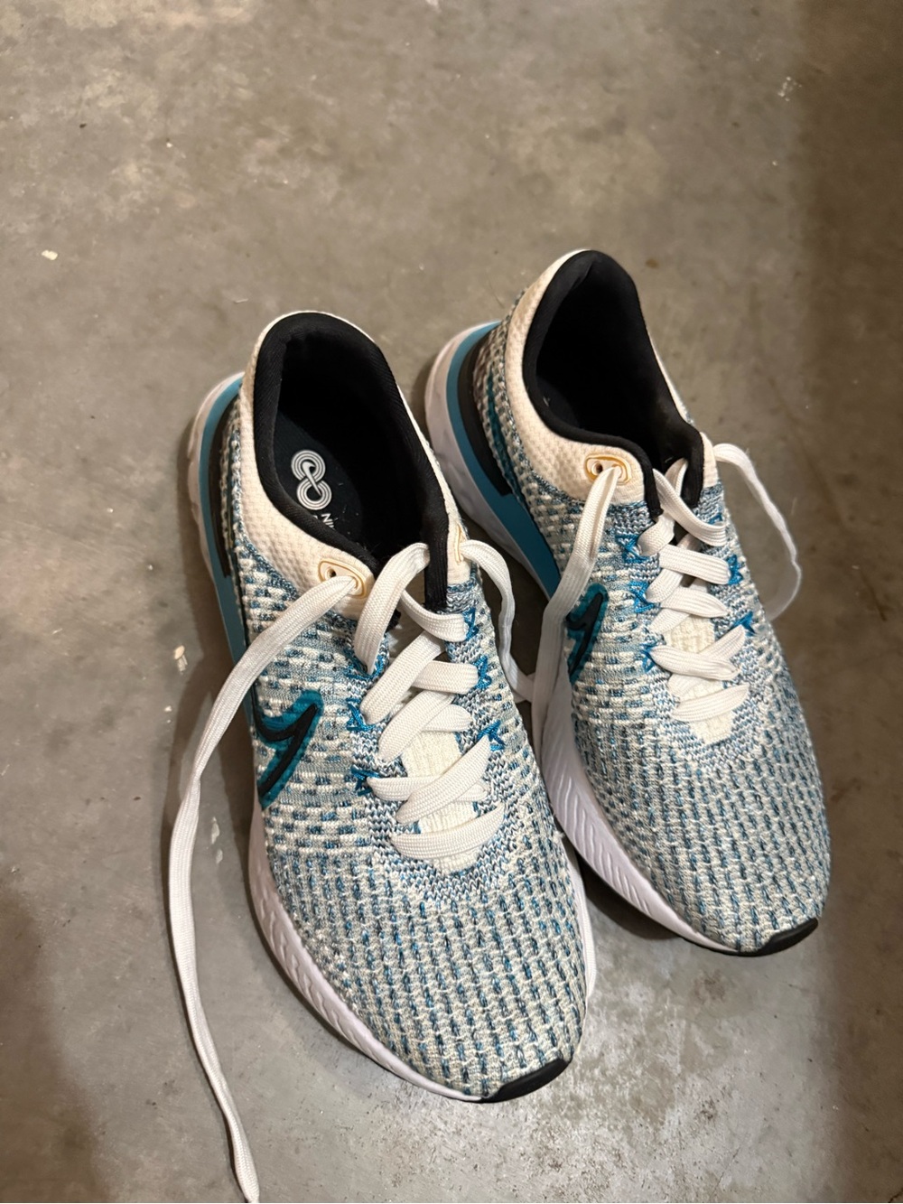 Nike Women's Knit Running Sneakers in White and Teal
